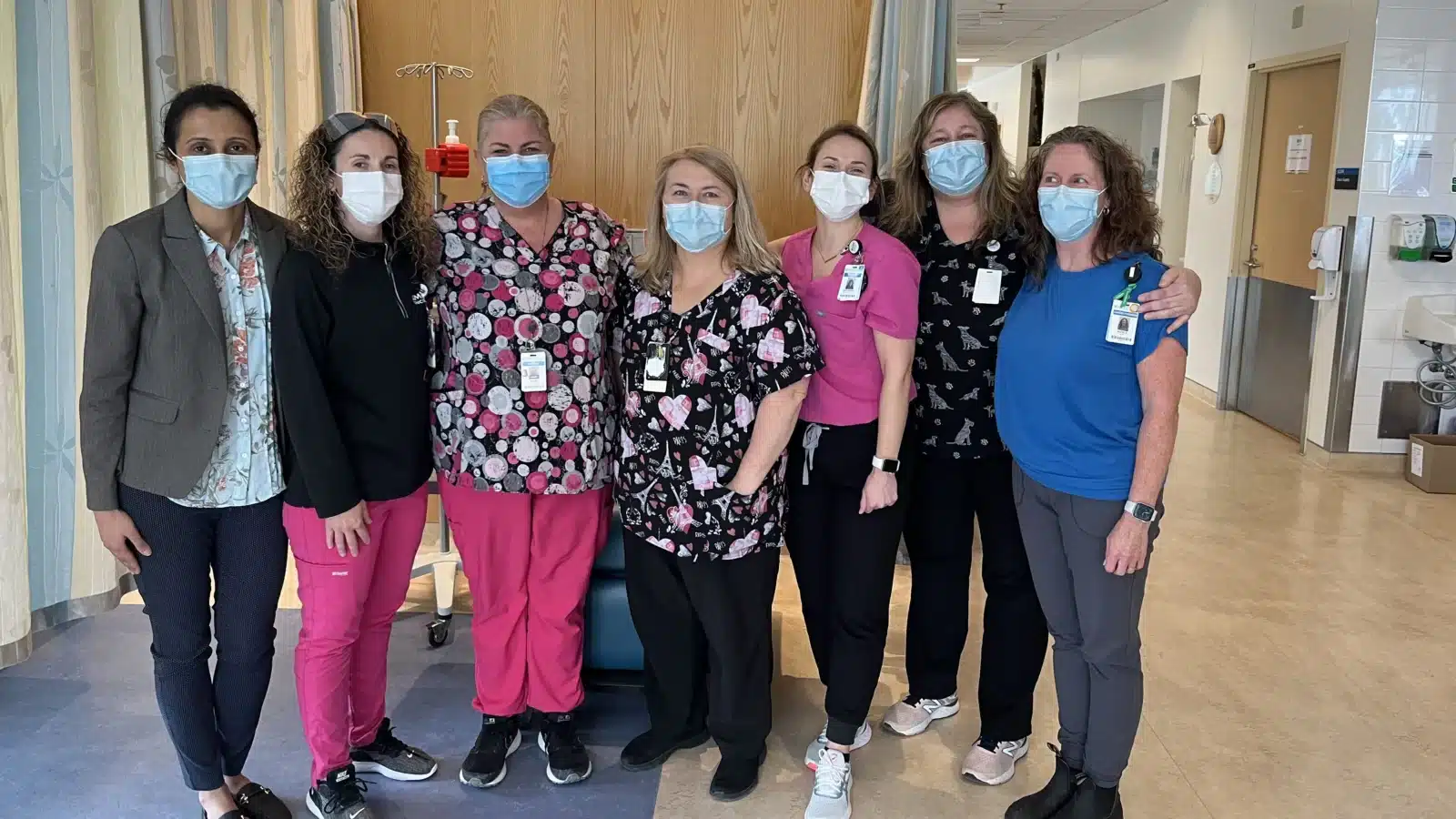 Jolene Bell a nurse at the Simcoe Muskoka Regional Cancer Centre, poses with her colleagues in the cancer centre for a photo
