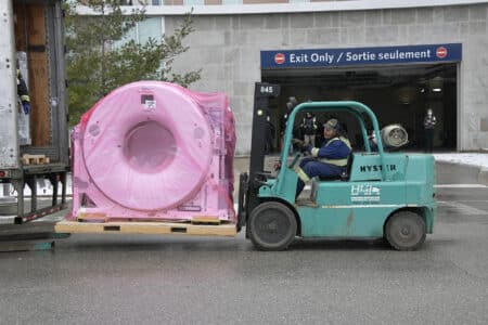 A forklift delivers components of RVH's new PET-CT machine.
